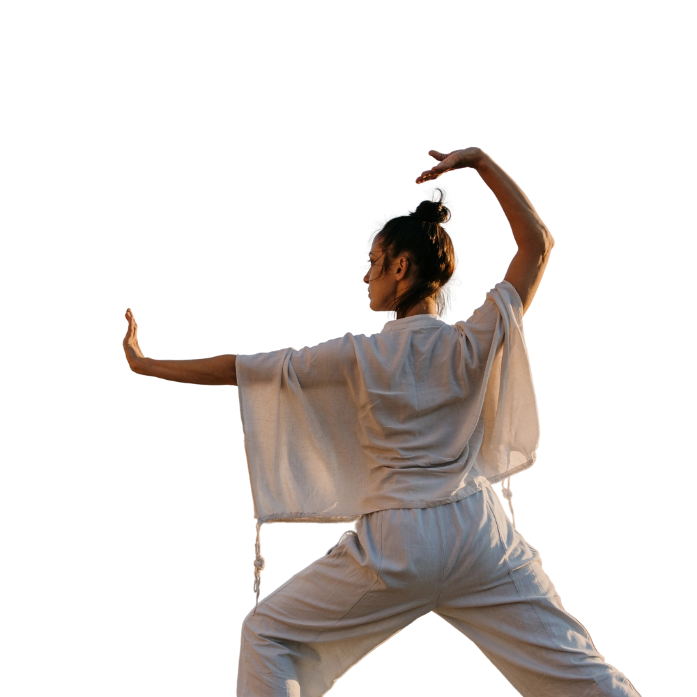 A woman practicing Tai Chi.